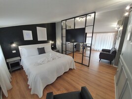 Superior Apartment | Down comforters, in-room safe, blackout drapes, iron/ironing board