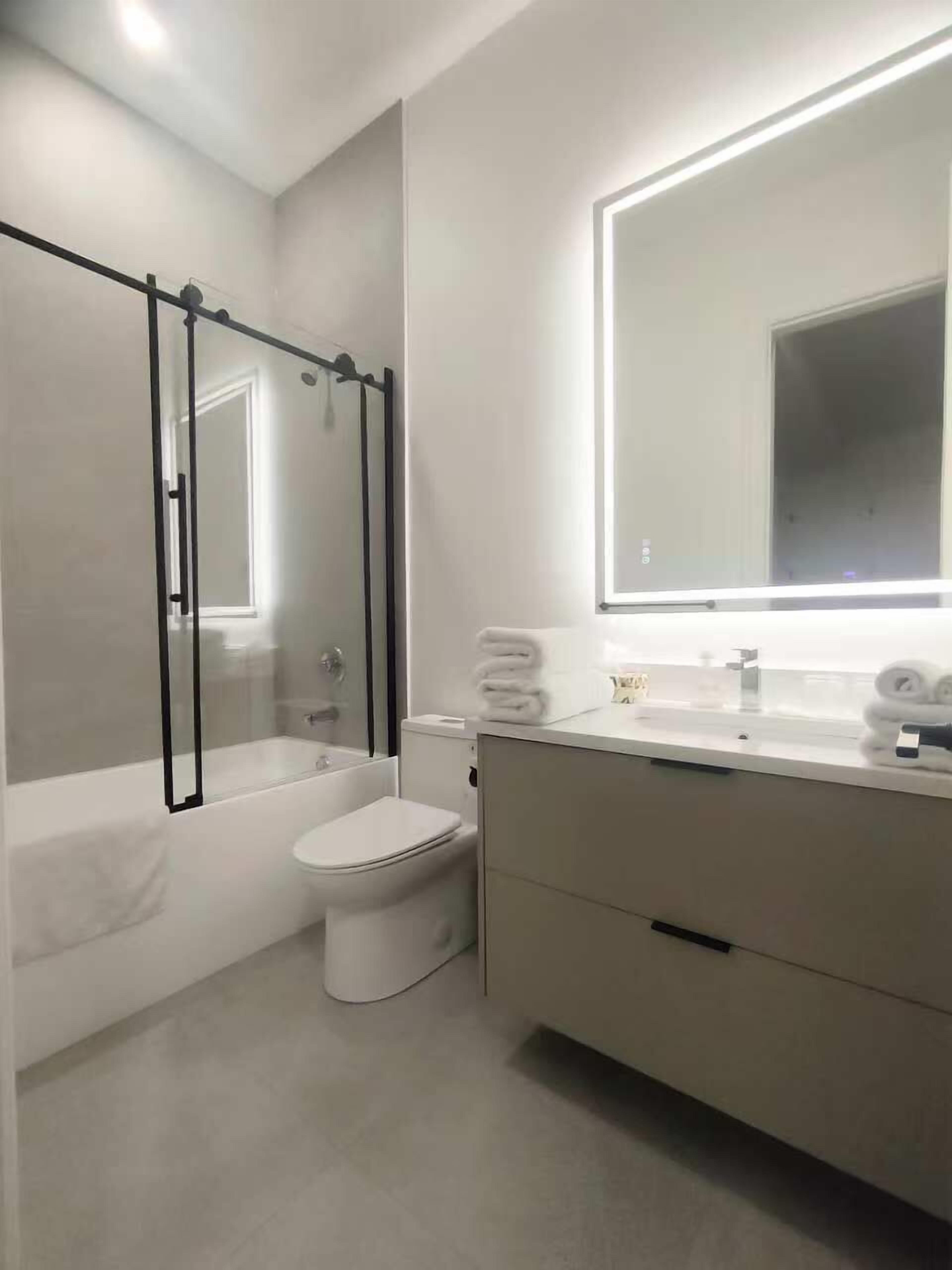 Habitación doble Elite, 1 cama Queen size | Baño | Regadera 