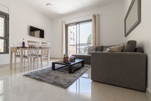 Comfort Apartment, 1 Bedroom | Living area | Flat-screen TV - Yafo 35 - Isrentals (Jerusalem)