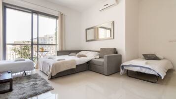 Comfort Apartment, 1 Bedroom | Living area | Flat-screen TV