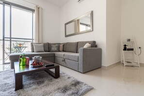 Comfort appartement, 1 slaapkamer | Woonkamer | Flatscreentelevisie
