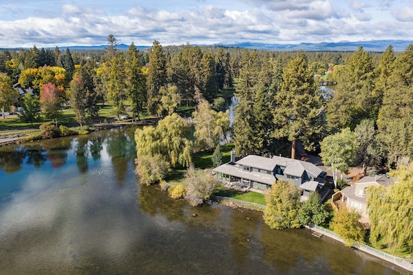 Riverfront home is directly on Mirror Pond across from Drake Park & Old Bend