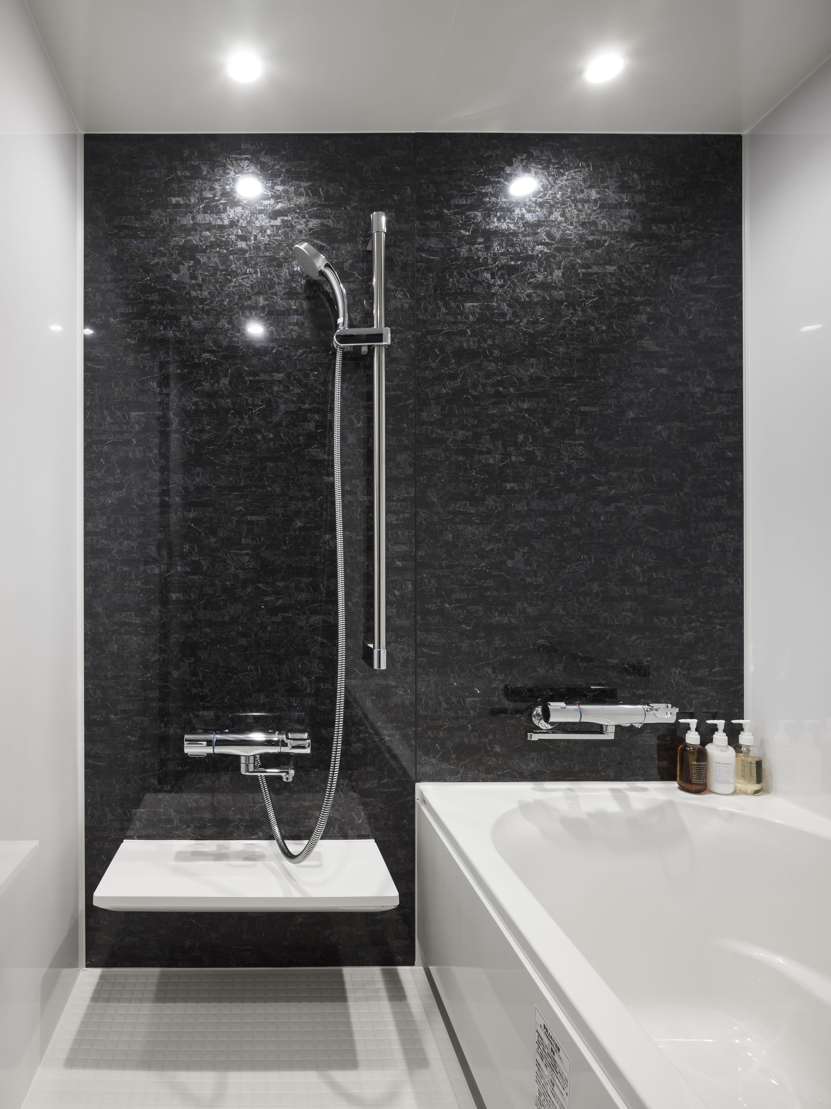 combined shower/bathtub, free toiletries, hair dryer, slippers