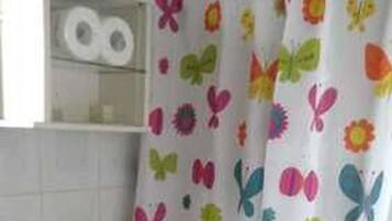 Combined shower/bathtub, deep-soaking bathtub, rainfall showerhead