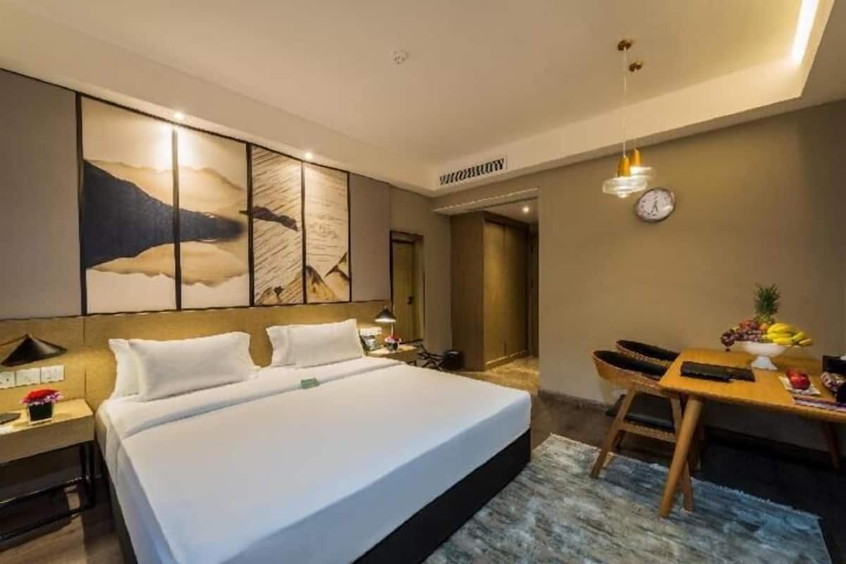 Premium bedding, memory-foam beds, in-room safe, blackout curtains