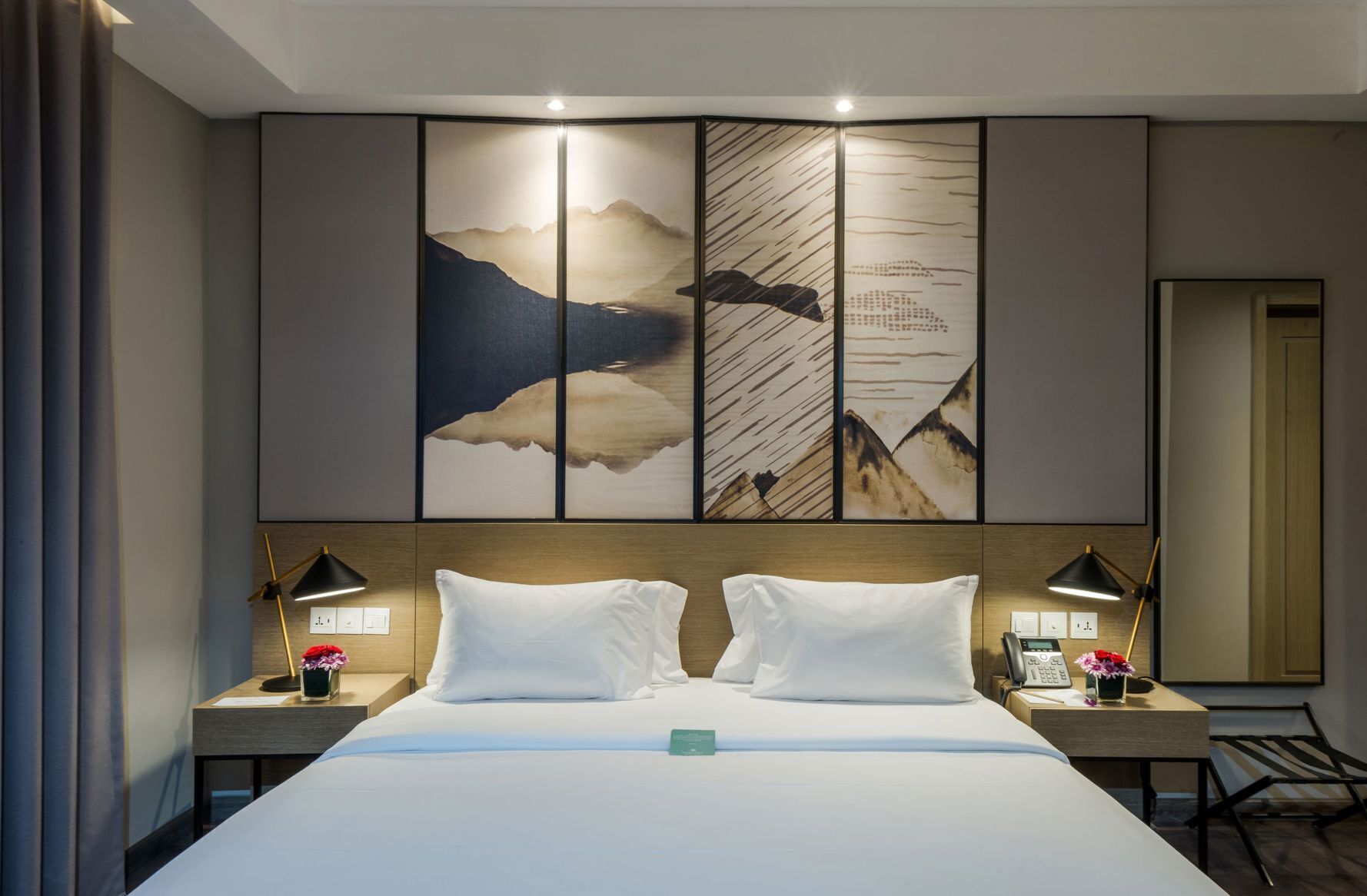 Premium bedding, memory-foam beds, in-room safe, blackout curtains