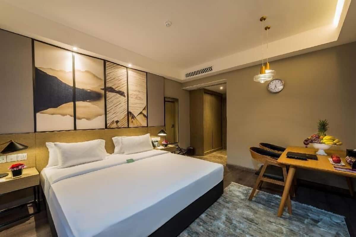 Premium bedding, memory-foam beds, in-room safe, blackout curtains