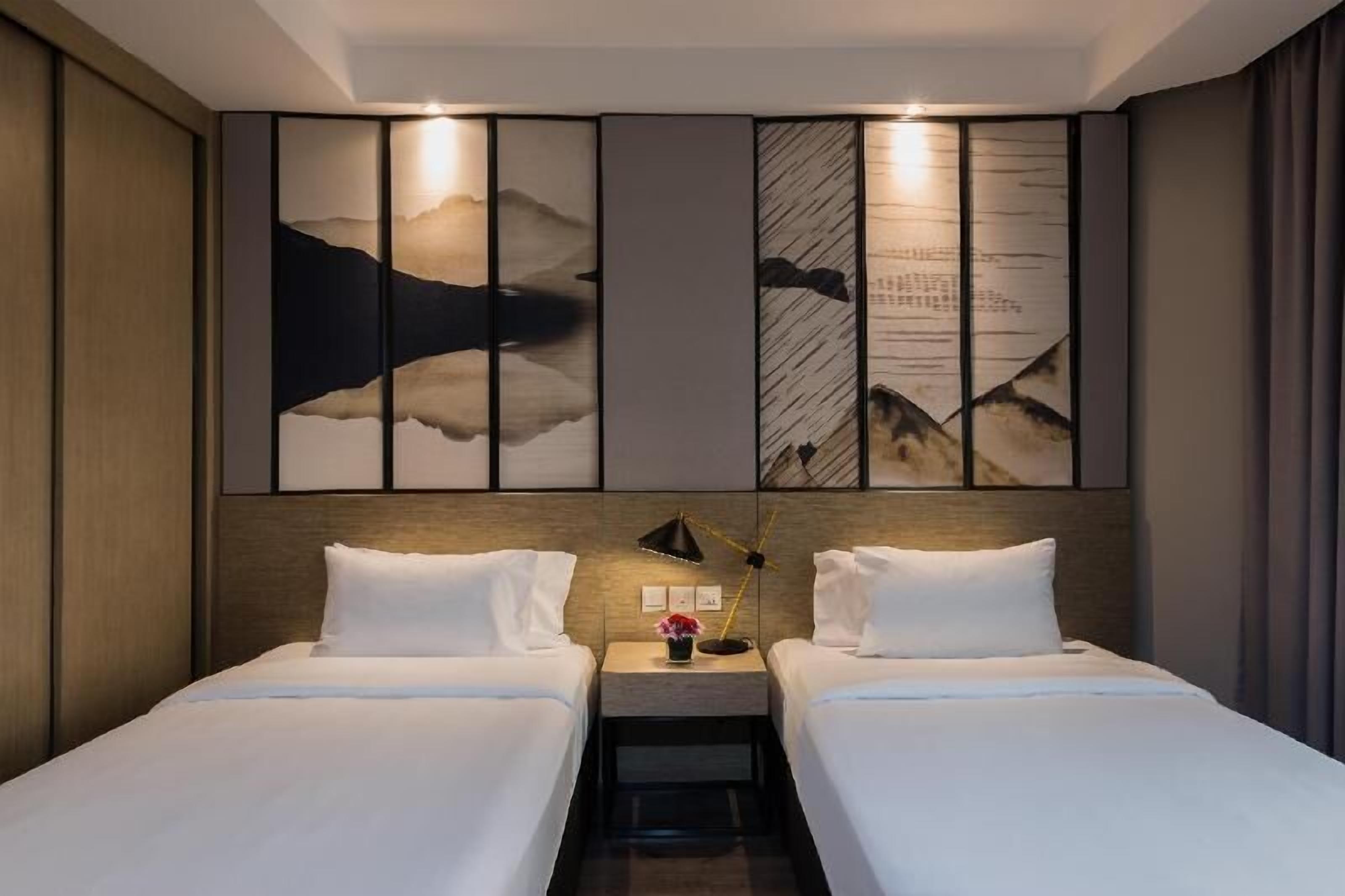 Premium bedding, memory foam beds, in-room safe, blackout drapes