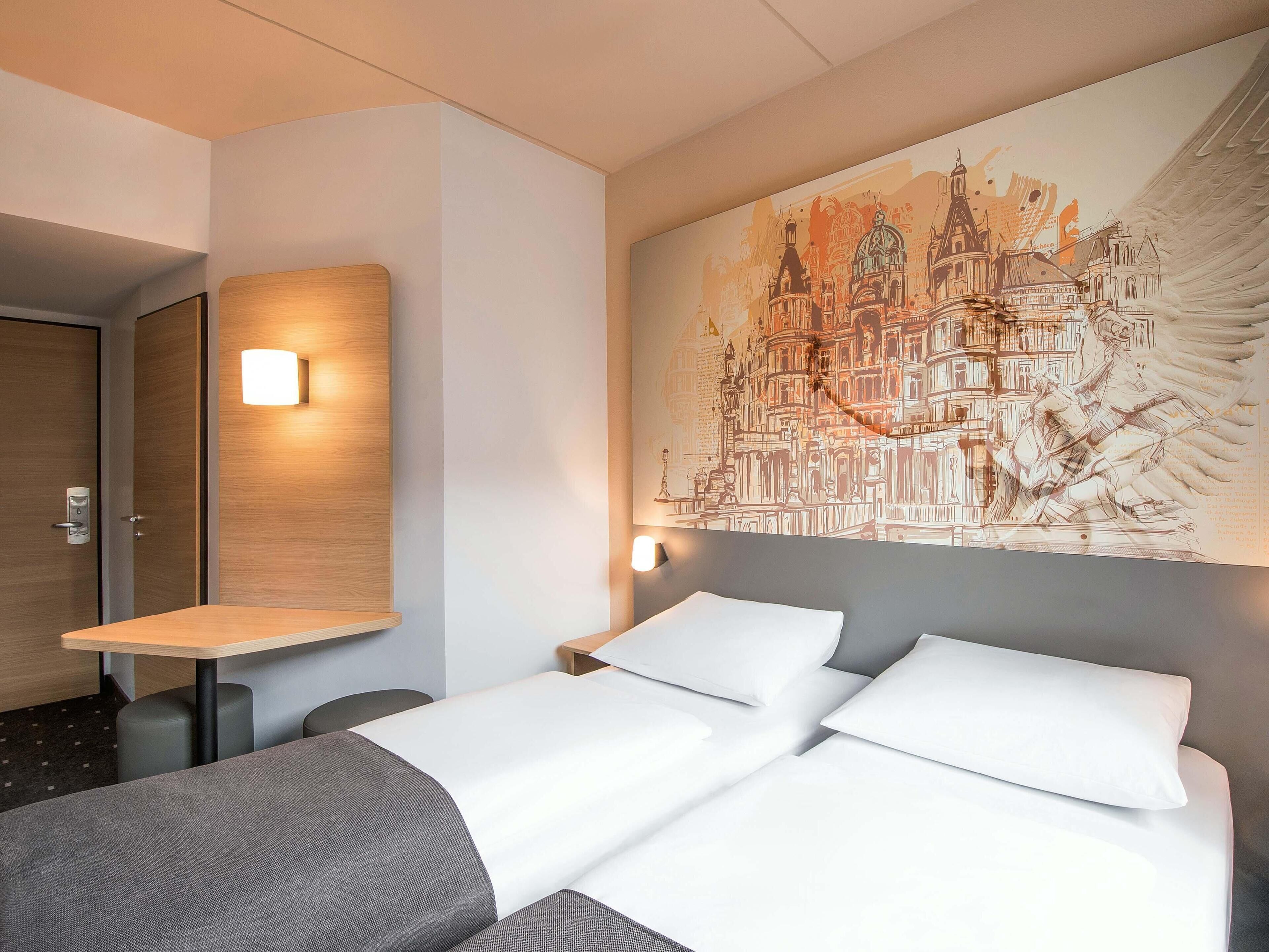 Habitación con 2 camas individuales | Escritorio, insonorización, wifi gratis y ropa de cama 