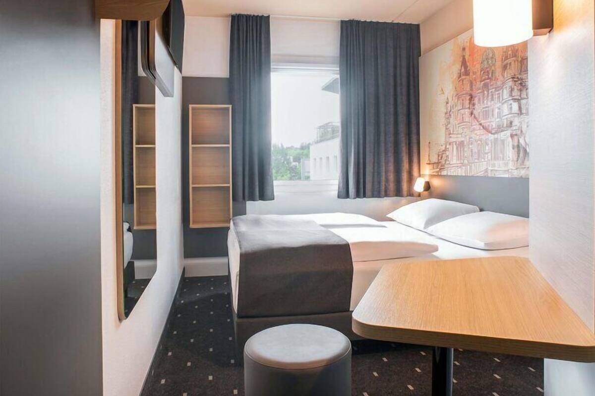 Habitación doble | Escritorio, sistema de insonorización, wifi gratis y ropa de cama