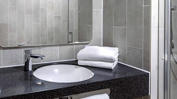 Shower, towels, soap, shampoo