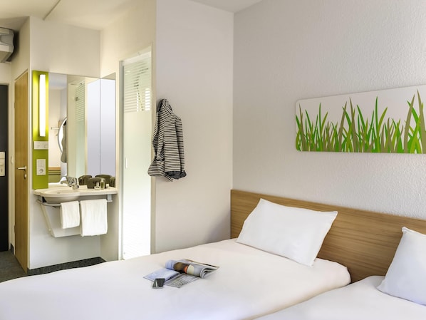 Zimmer, 2 Einzelbetten | Schallisolierte Zimmer