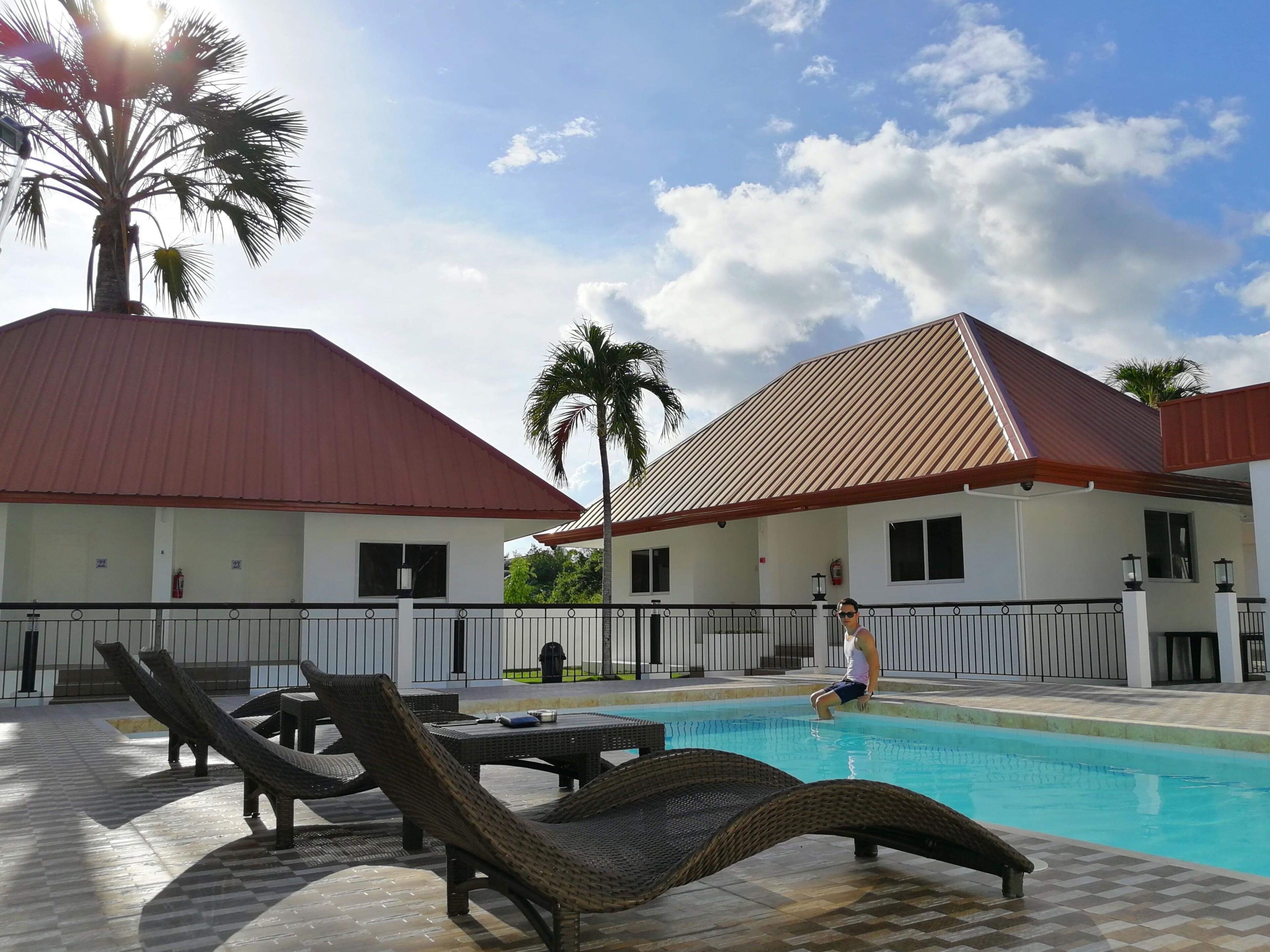 outdoor pool, open 8:00 am to 10:00 pm, pool umbrellas, pool loungers