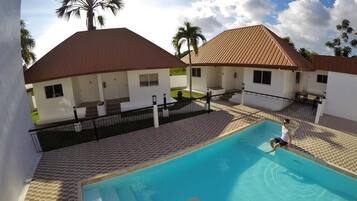 Outdoor pool, open 8:00 AM to 10:00 PM, pool umbrellas, sun loungers