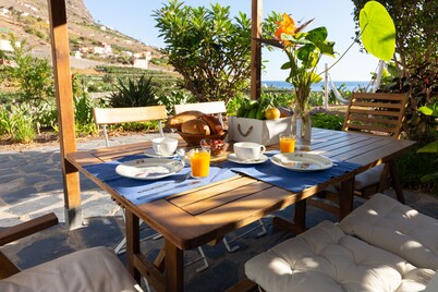 REST ENJOYING THE VIEWS OF THE SEA AND THE MOUNTAIN