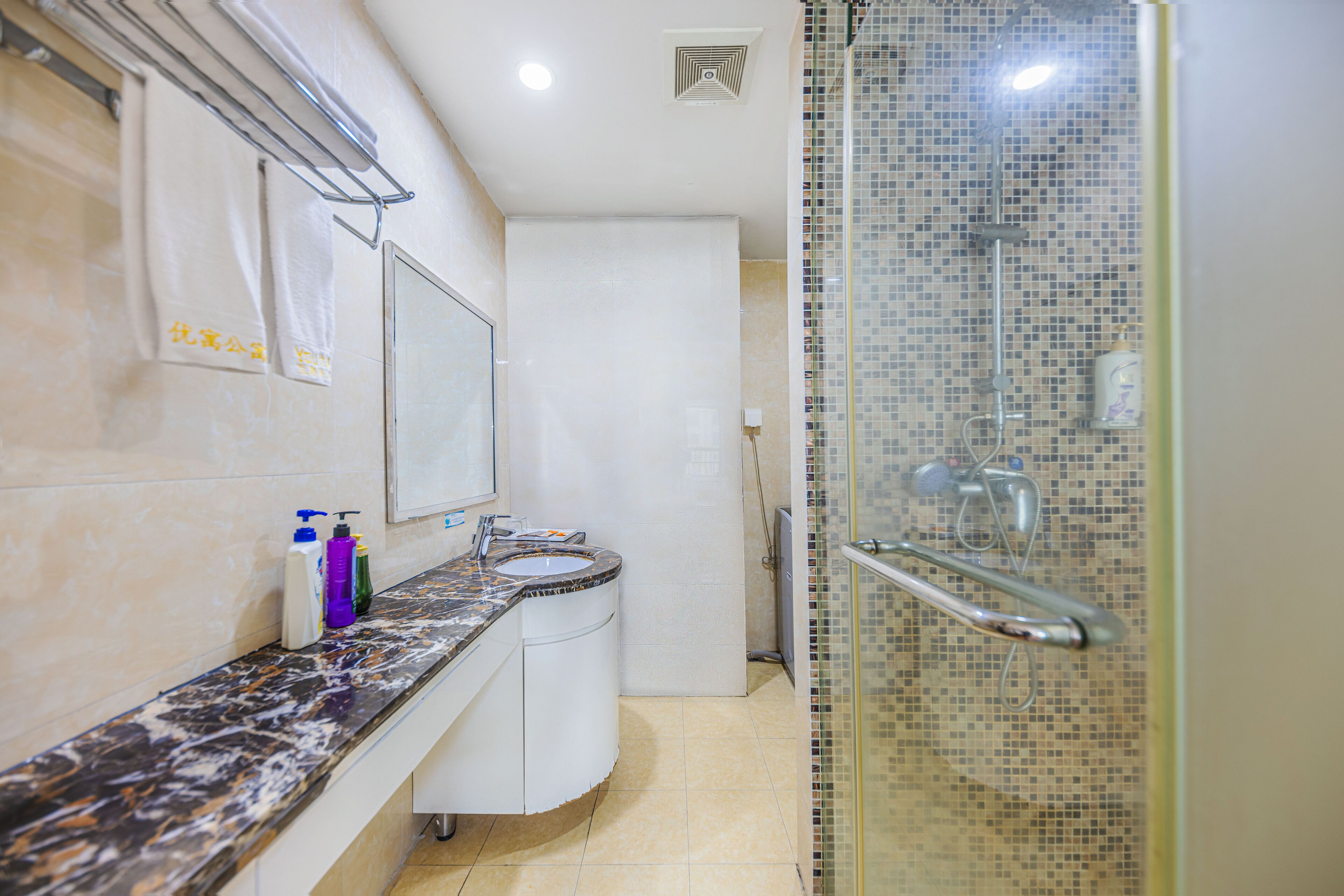 Shower, free toiletries, hair dryer, slippers