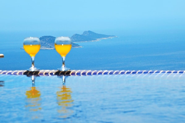 Outdoor pool, pool umbrellas, pool loungers
