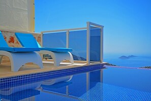Outdoor pool, pool umbrellas, pool loungers