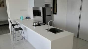 Condo, 1 Bedroom | Private kitchenette | Full-size fridge, microwave, stovetop, electric kettle