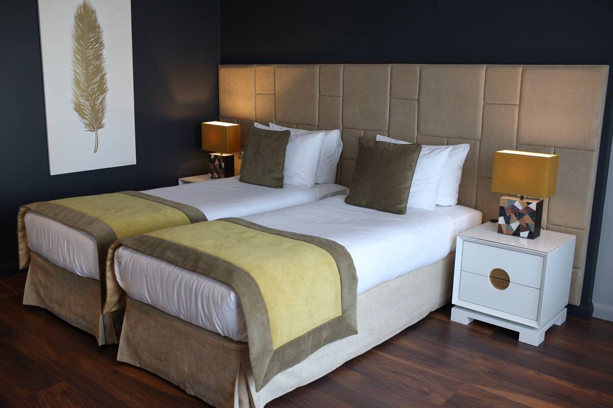 Suite Premier | 1 habitación, minibar, caja de seguridad en la habitación y escritorio