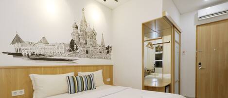 Deluxe kamer, 1 kingsize bed | Een bureau, gratis wifi, beddengoed