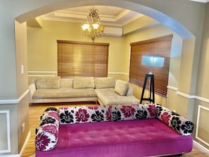 City Apartment, 3 Bedrooms | Living area | Flat-screen TV