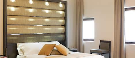 Deluxe Quadruple Room (quadruple) | 1 bedroom, premium bedding, down duvets, Select Comfort beds