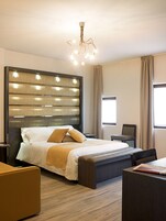 Deluxe Quadruple Room (quadruple) | 1 bedroom, premium bedding, down comforters, Select Comfort beds
