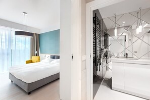 Deluxe-huoneisto, 1 makuuhuone, tupakointi kielletty, keittotila | Tallelokero huoneessa, yksilöllisesti kalustettu, pimennysverhot