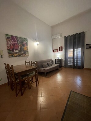 Comfort Apartment, City View | Living area | 22-inch flat-screen TV with digital channels, TV, first-run movies
