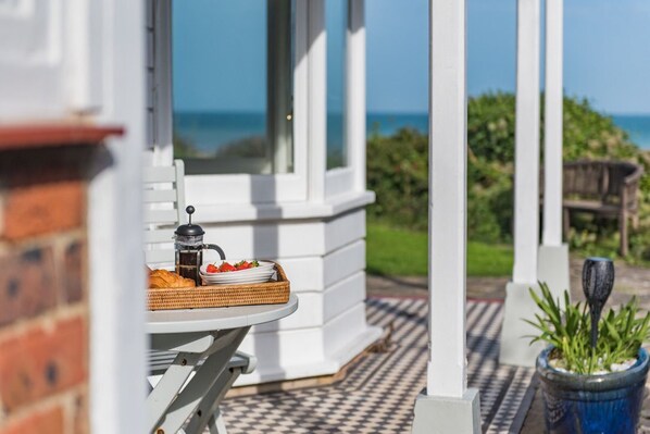 Outdoor dining - A luxury coastal holiday home with panoramic views of the English Channel (Kinsdown)