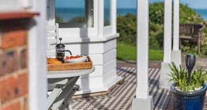 A luxury coastal holiday home with panoramic views of the English Channel