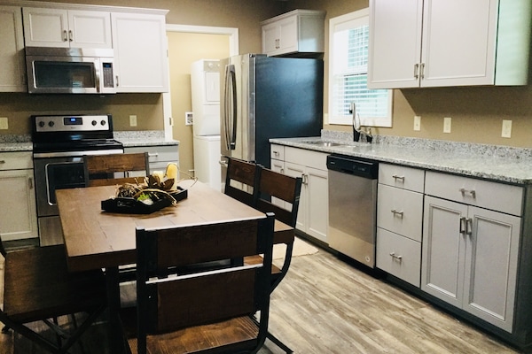 Kitchen with granite counter tops, stainless appliances, Keurig Coffee mak