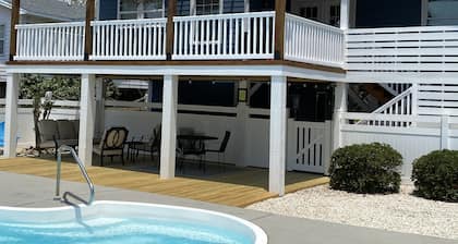 4 Bed 3.5 Bath Pool Mid Island, Quiet Garden lined Street, steps from the Beach!