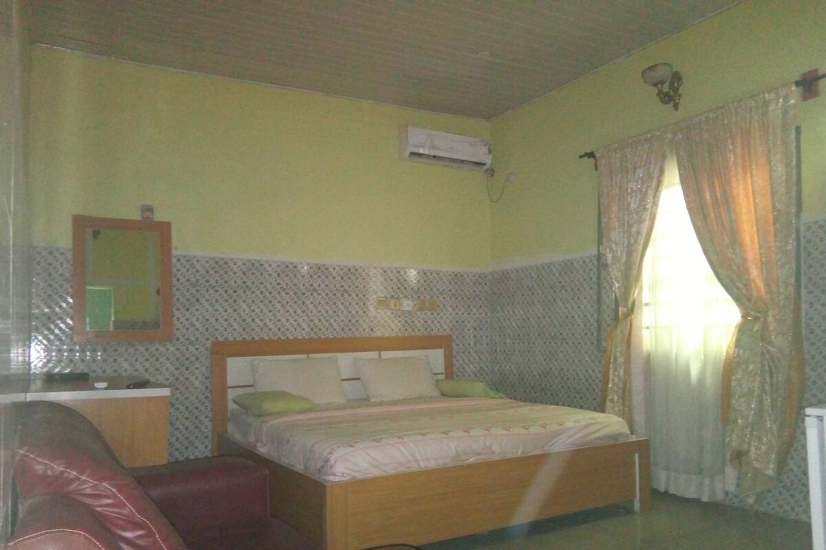 Minibar, desk, bed sheets