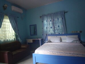 Minibar, desk, bed sheets