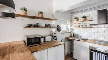 Studio, 2 lits une place | Cuisine privée