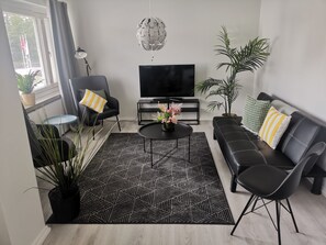 Lägenhet Superior - 1 sovrum | Vardagsrum | Platt-tv
