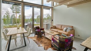 Duplex Suite | Living area | Flat-screen TV - Naava Chalet (Ahtari)