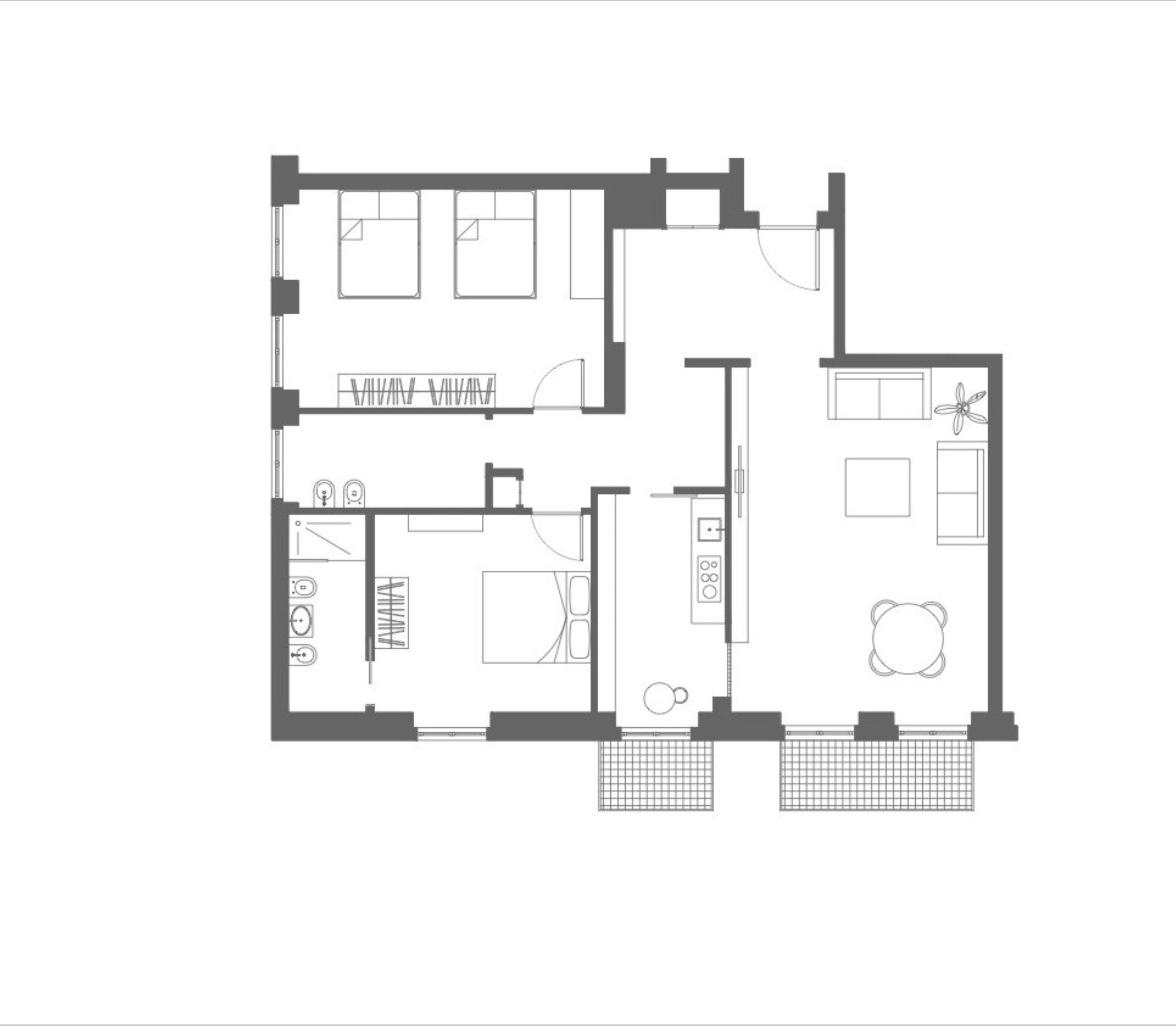 A floor plan of a hotel room with a kitchenette, a bathroom, a living area, and a small balcony.