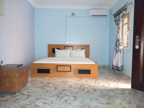 Desk, laptop workspace, bed sheets