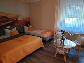 Triple Room | Desk, free cribs/infant beds, free WiFi, bed sheets