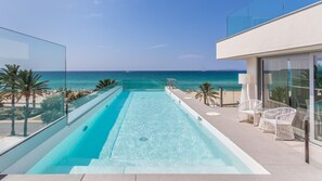 Outdoor pool, pool umbrellas, pool loungers