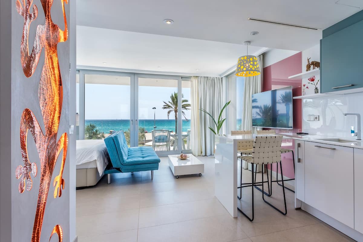 Deluxe Suite, 2 Bedrooms (Lovers Paradise) | Living area | 46-inch LED TV with satellite channels, TV
