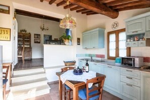 Apartment, 2 Bedrooms | Private kitchen | Fridge, microwave, stovetop, electric kettle