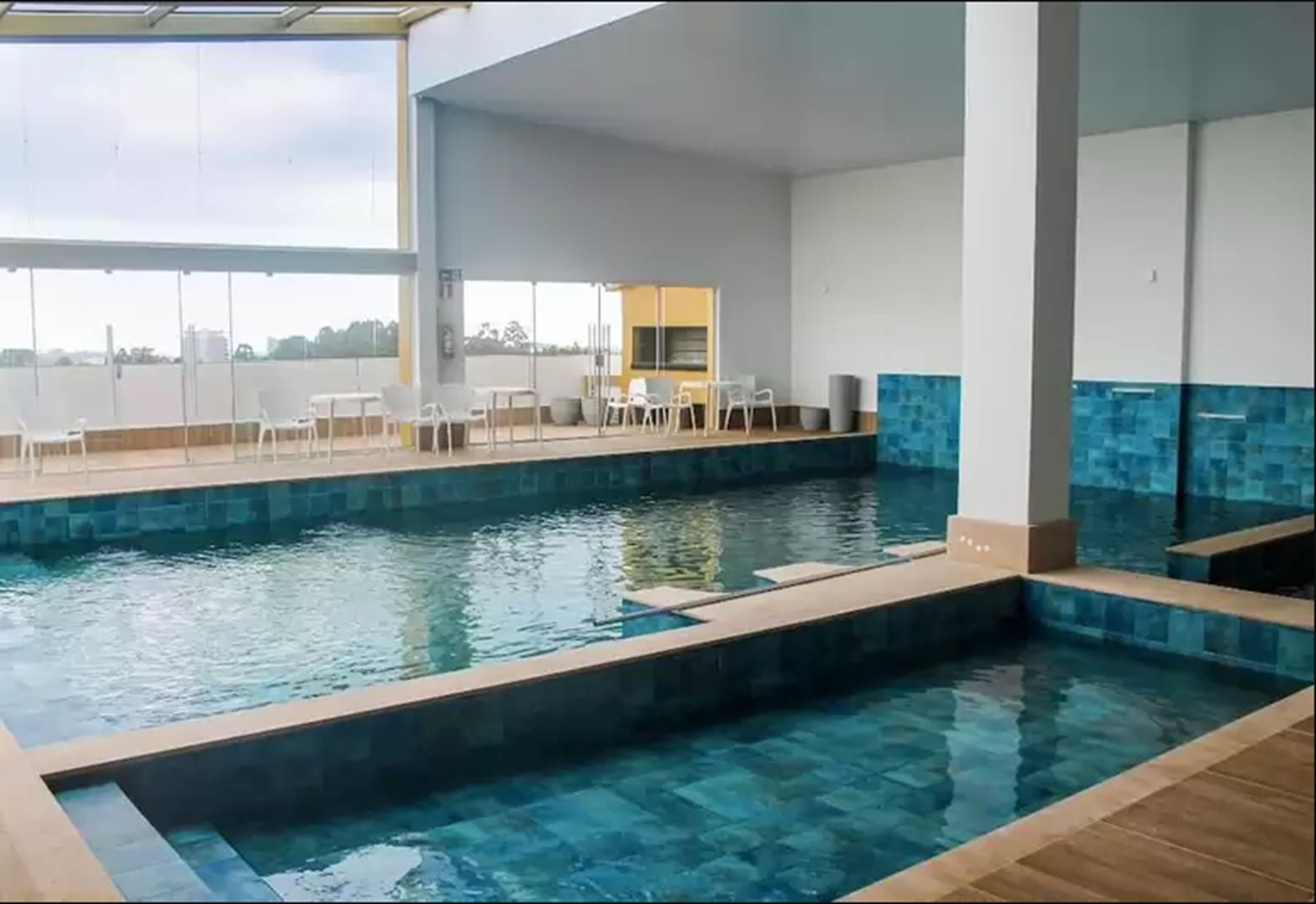 indoor pool, open 8:00 am to 10:00 pm, pool loungers