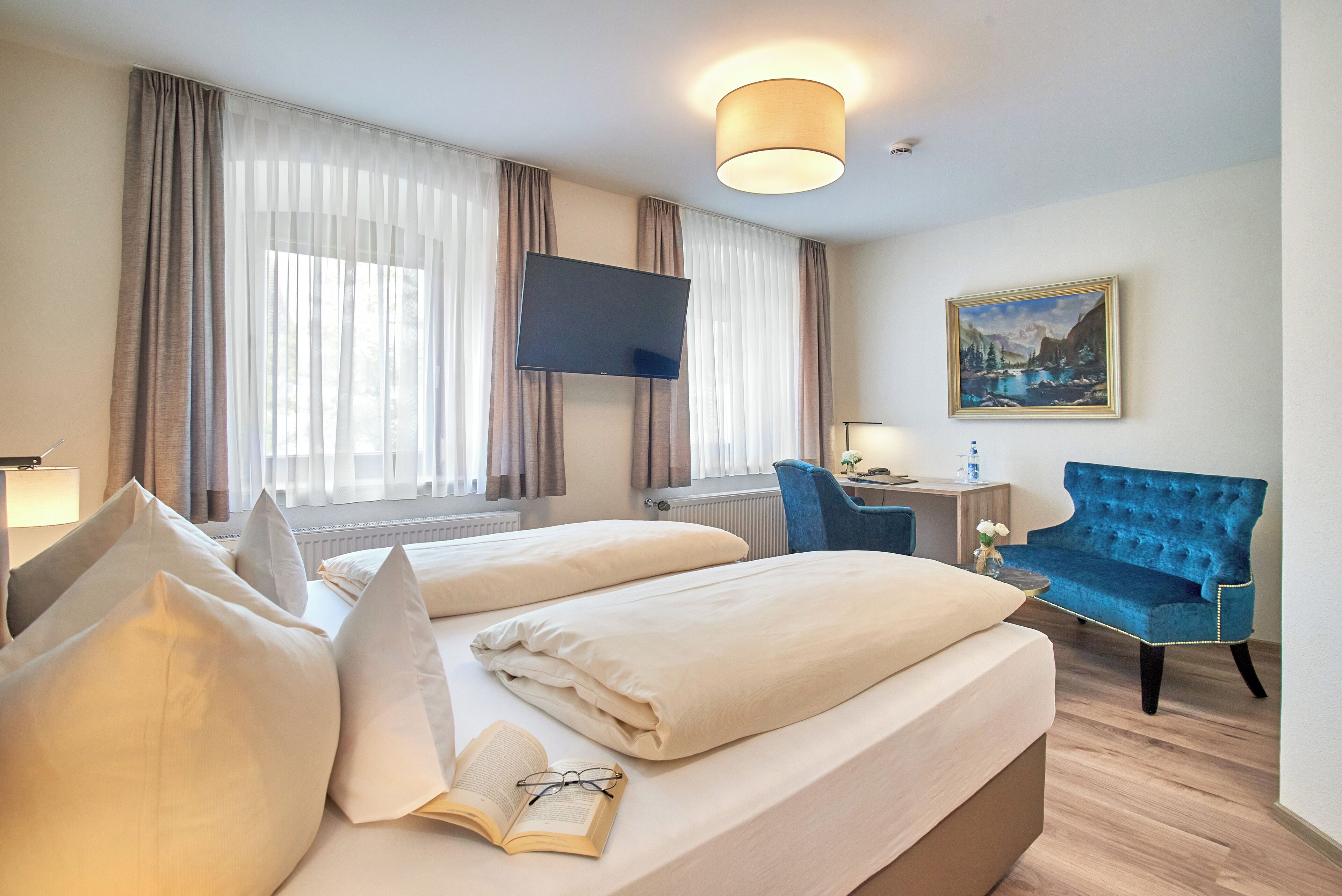 comfort double room (theresia) | hypo-allergenic bedding, desk, laptop workspace, blackout curtains