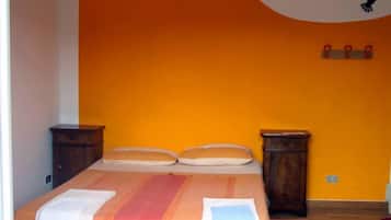 Basic Quadruple Room, Multiple Beds, Non Smoking | Free WiFi, bed sheets