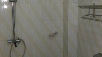 Shower, rainfall showerhead, towels