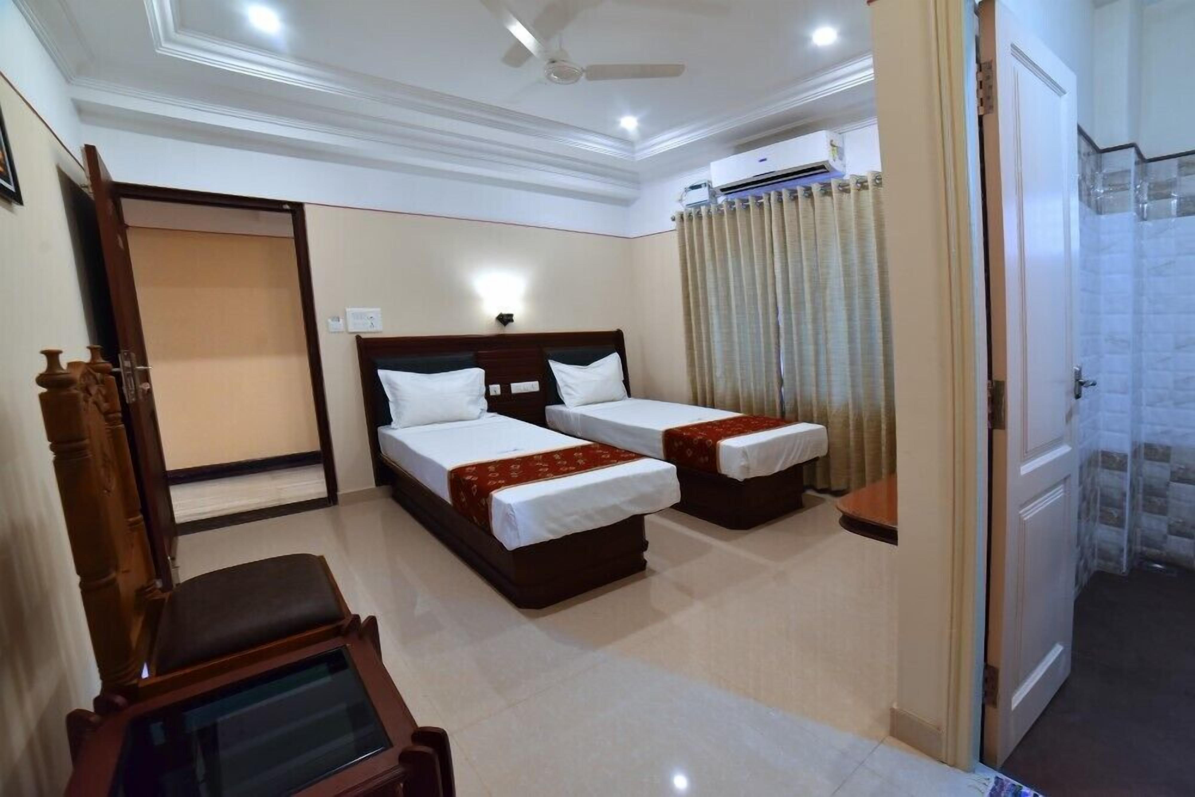 Deluxe Room AC | Premium bedding, in-room safe, individually furnished, desk